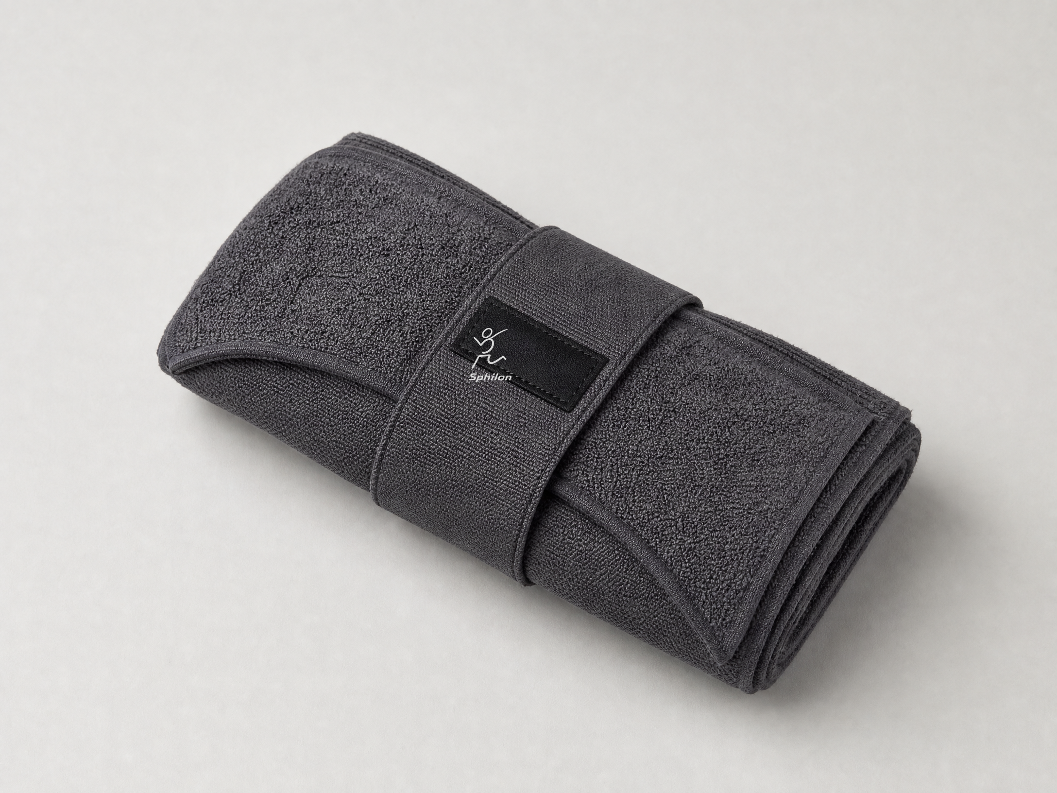 Studio Towel Carry Wrap — Recycled cotton terry with central black woven label
