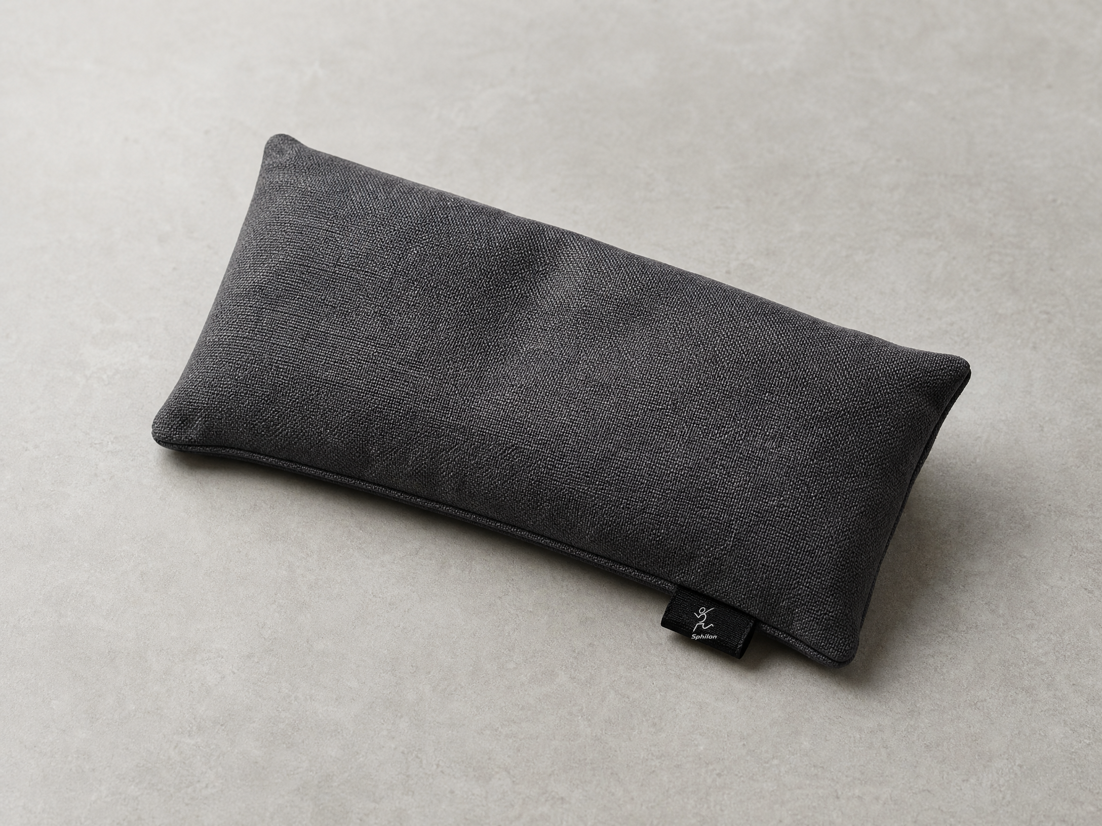 Weighted Eye Pillow — Recycled textured textile with lower-edge black woven label