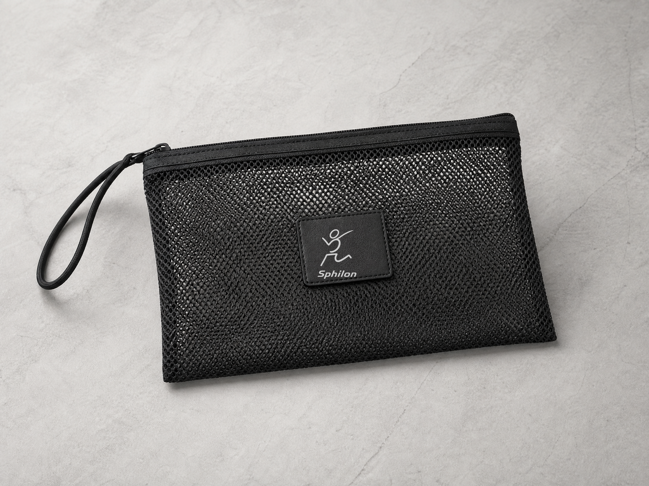 Mesh Beach Organizer — Recycled mesh polyester with front black leather patch