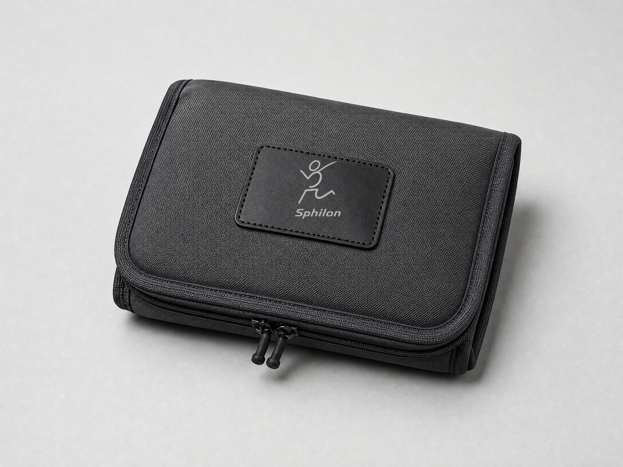 Foldable Tech Pouch — Recycled nylon with front black leather patch